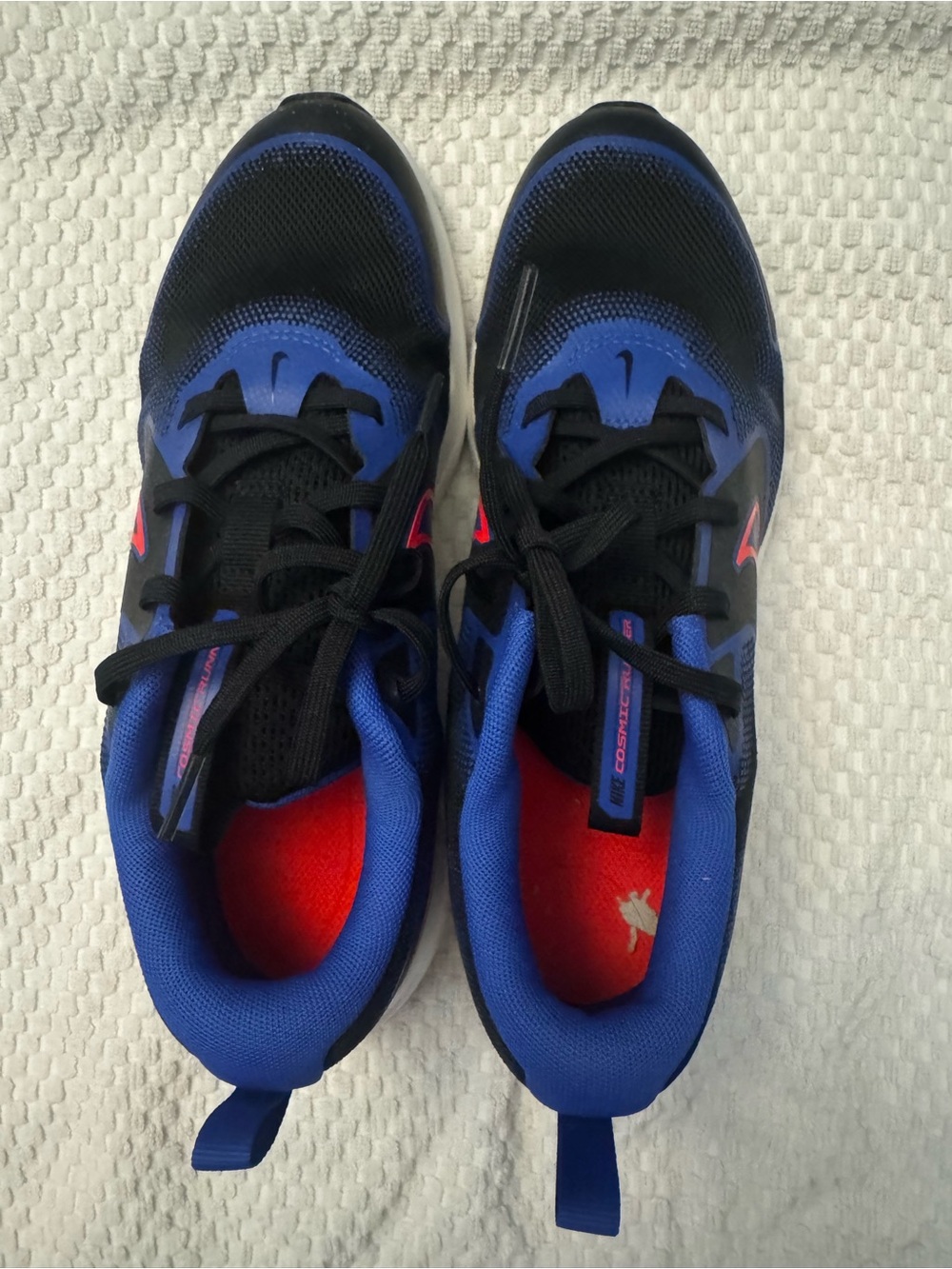Nike Kids Black and Blue Sneakers with Pink Accents